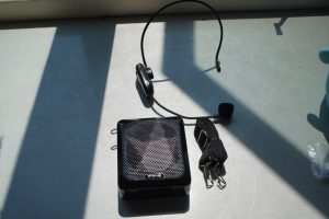 Smaller version of the PA system. Mic attaches to person.